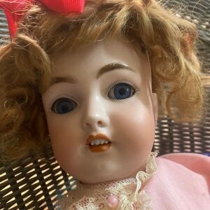 Charming Doll with Pink Dress and Red Bow